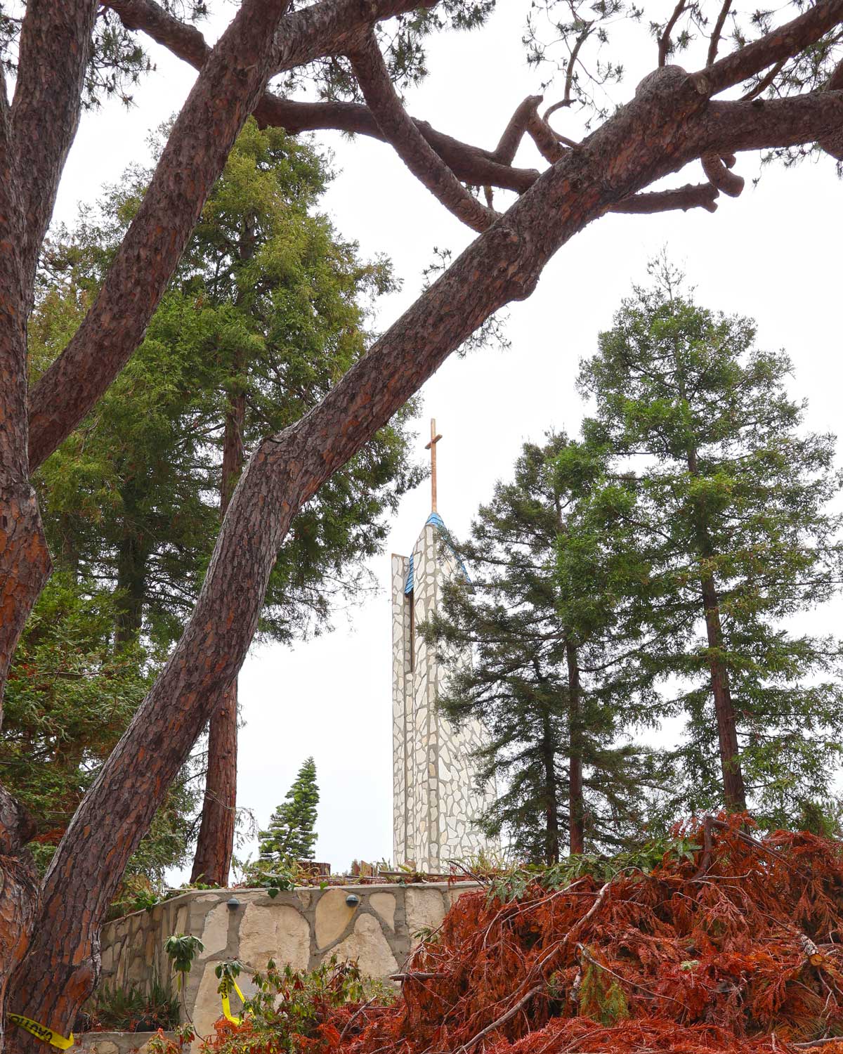 View of the Hallelujah bell tower through a disassembled Wayfarers Chapel